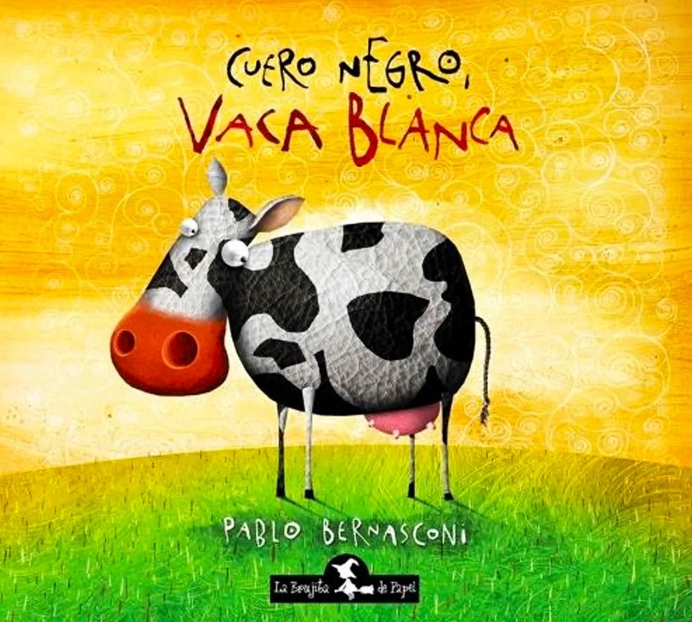 Cuero negro vaca blanca